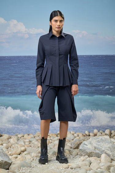 Navy relaxed shirt for women with oversized fit and fluid silhouette