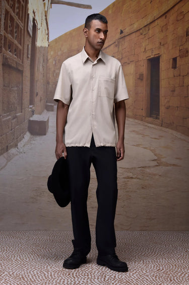Beige wool blend shirt with relaxed silhouette and modern minimal design