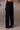 Black Textured Poly Lycra Straight-Leg Trousers - Genes Online Store
