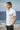 Blue polo t-shirt for men with collar neckline and print detailing