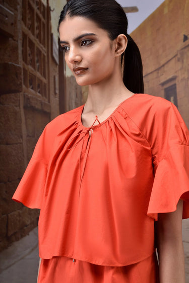 Red flounce sleeve dress with flowy silhouette and soft breathable fabric