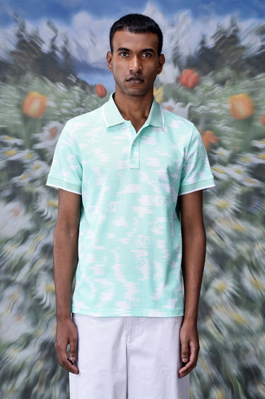 Green polo T-shirt with ikkat pattern and breathable fabric