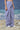 Navy cotton trousers for women showing breathable textured fabric
