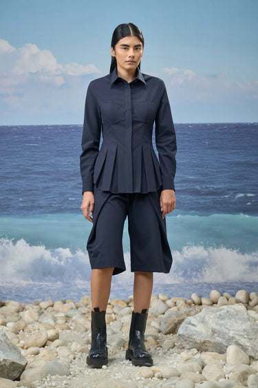 Navy relaxed shirt for women with oversized fit and fluid silhouette