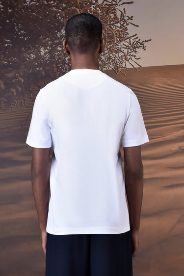 Designer white graphic T-shirt styled for everyday and streetwear looks