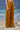 Caramel viscose nylon trousers for women showing smooth breathable fabric texture