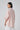 Stylish pink relaxed shirt for women with high low hem, designer wear India