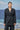 Black cotton linen jacket for women showing breathable natural fabric texture