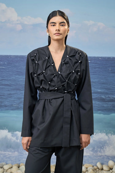 Black cotton linen jacket for women showing breathable natural fabric texture