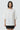 Women white designer relaxed top with embroidery, luxury casual wear India