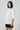 White relaxed fit top women India with embroidered detailing, modern fashion
