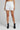 Women white designer shorts with embroidery, luxury summer fashion India
