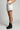 White tailored shorts women India with embroidered hem, modern minimal style