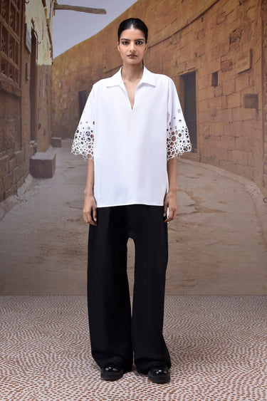 White poplin shirt with embroidered cut out sleeves for women by Genes Lecoanet Hemant India