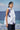 White and navy cotton poplin top for women showing breathable crisp fabric texture