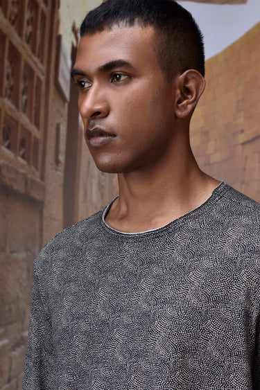 Black long sleeve cotton jersey T-shirt for men with subtle micro-pattern texture