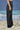Black trousers for women with high-rise waist and structured front detail