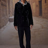 Black shiny velvet double breasted jacket for men by Genes Lecoanet Hemant India
