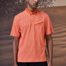 Coquelicot red cotton piqué polo T-shirt with micro-pattern texture for men