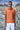 Linen polo shirt in dark caramel color with relaxed fit for men