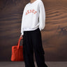 Ecru Crew Neck Sweatshirt with Textured GENES Appliqué - Genes Online Store