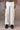 Ecru quilted cargo trousers for men by Genes Lecoanet Hemant India