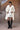 Ecru long coat women India structured silhouette with modern layering style