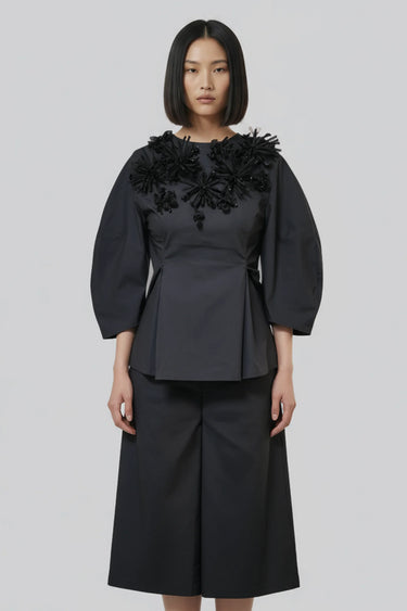 Women black designer peplum top with embellishments, luxury evening wear India
