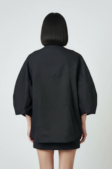 Stylish black relaxed top for women, fluid drape designer wear India