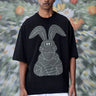 Black cotton T-shirt with minimal rabbit line artwork and relaxed fit