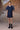 Navy cotton dress with feminine flounce sleeve detail and flowy fit