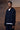 Premium navy hoodie with half-zip closure and adjustable hood in stretch fabric
