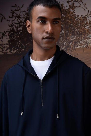Navy long sleeve hoodie for men with relaxed silhouette and minimal detailing