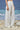 White trousers for women with relaxed fit and fluid silhouette