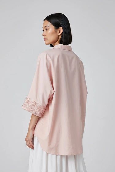 Stylish pink relaxed shirt for women with high low hem, designer wear India