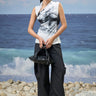 Premium poly satin sleeveless top for women with abstract graphic print