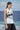 Premium poly satin top for women showing smooth lightweight fabric texture