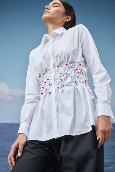 White shirt for women with smocked design and button-down detail