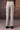 Designer beige poly wool trousers with sharp fit and minimal design