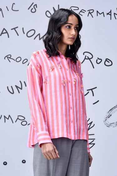 Coral embroidered shirt with tassel accents and relaxed fit