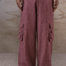 Cherry lacquer textured cargo pants for men by Genes Lecoanet Hemant India