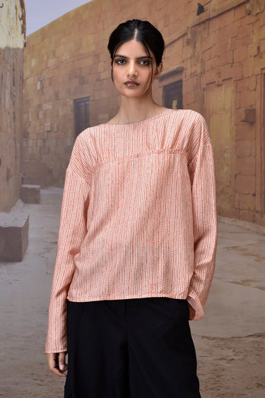 Women red textured long sleeve blouse with yoke detail, designer fashion India