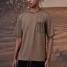 Beige T-shirt with subtle texture and chest pocket detail for casual wear