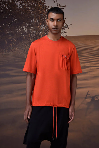 Red textured T-shirt with chest pocket detail and soft breathable fabric