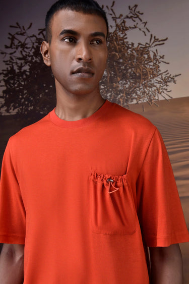 Textured red T-shirt styled for everyday and travel wear