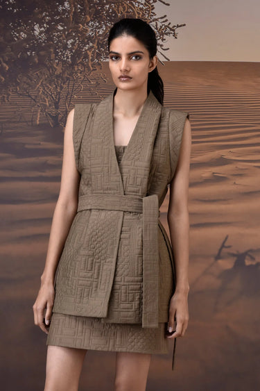 Beige quilted jacket women India with textured pattern and modern silhouette