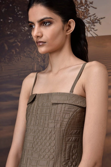 Designer beige cocktail dress women India quilted fabric and sleek silhouette