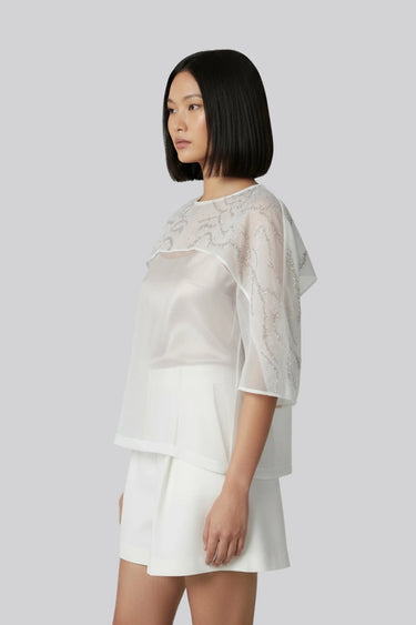 White overlay top women India with embroidered detailing, elegant modern wear