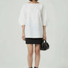 White embroidered relaxed top for women by Genes Lecoanet Hemant India