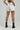 Stylish white summer shorts for women, premium designer resort wear India